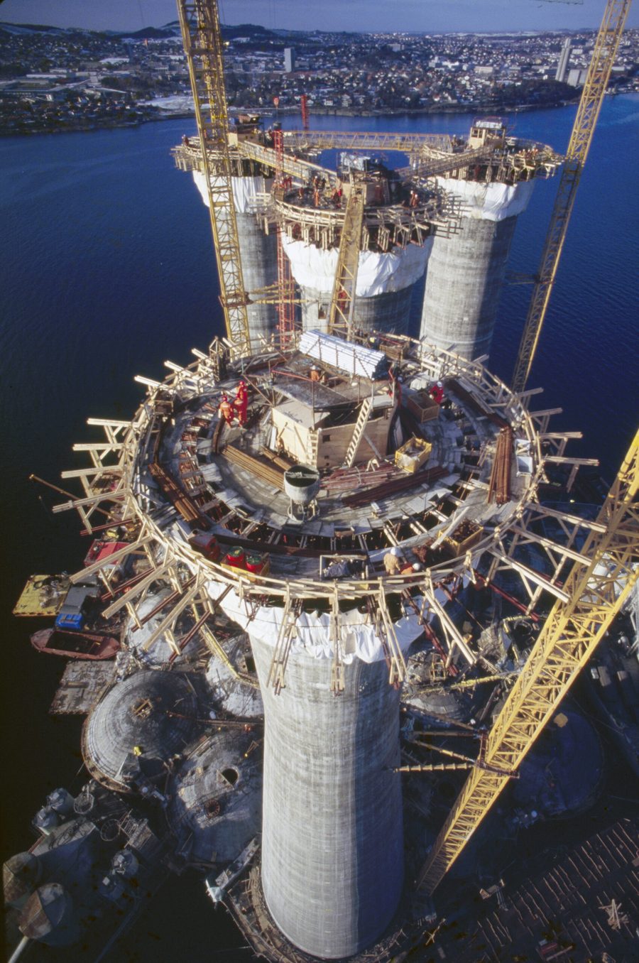 Aerial view of the slip-form deck during shaft construction, workers visible for scale